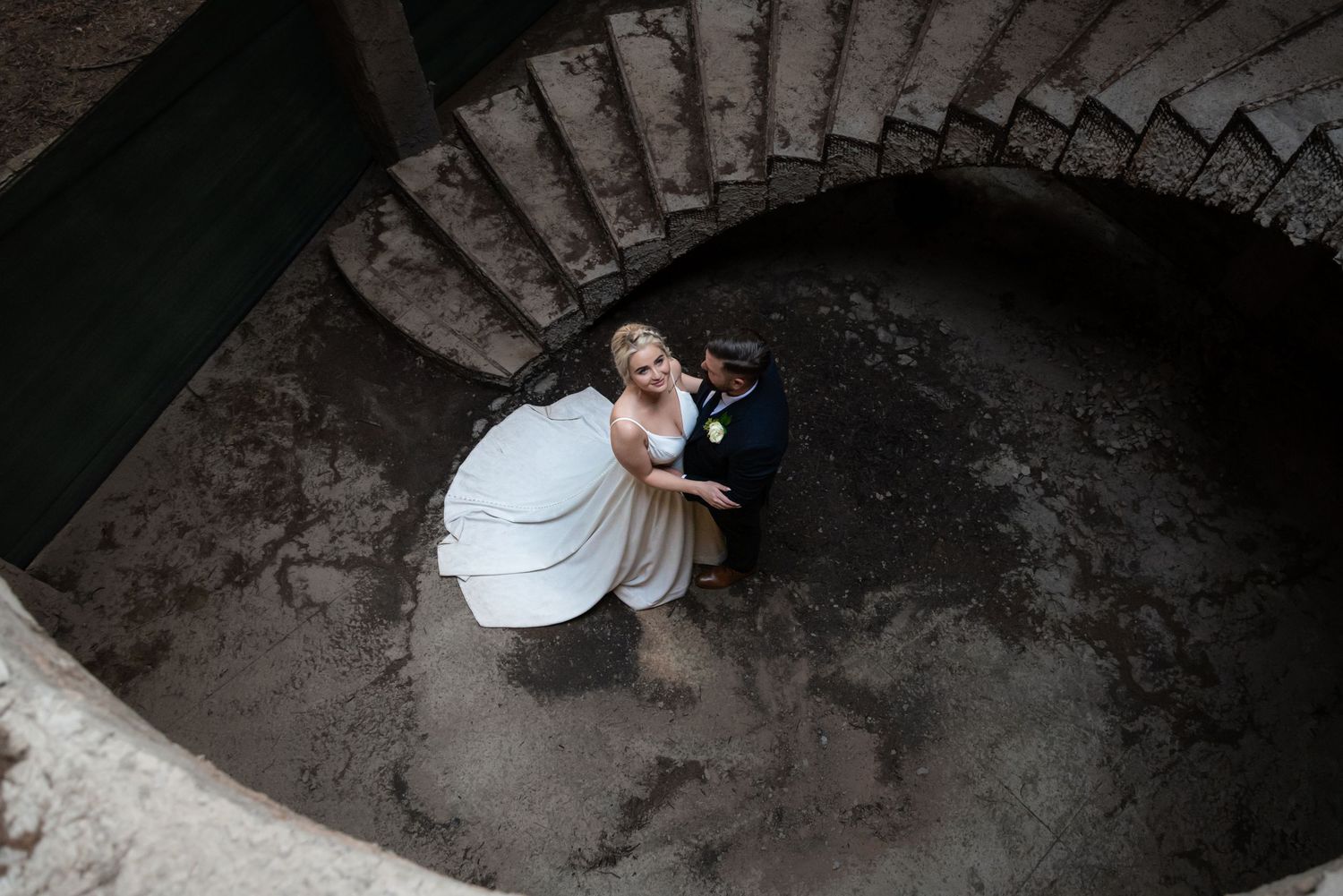 Bride and groom portrait on staircase during wedding in Gauteng with natural, elegant style