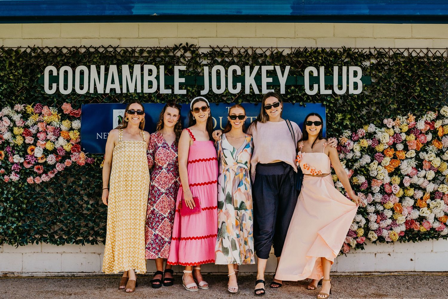 A group of 6 Girls dressed up for a day at the Country Championships held in Coonamble NSW at the Coonamble Jockey Club