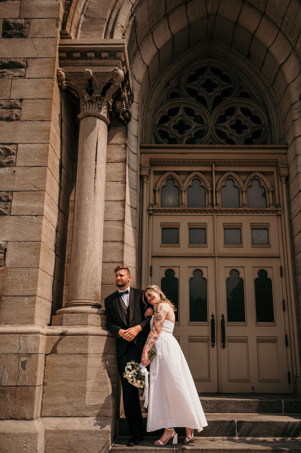 Captured series of four wedding photographs against ornate Gothic stone church facade with arched doorways and columns.