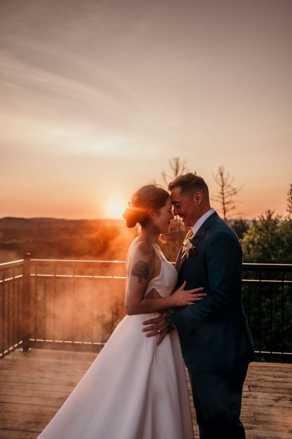 A romantic sunset wedding photoshoot sequence showing a couple embracing on a balcony with golden sunlight behind them.