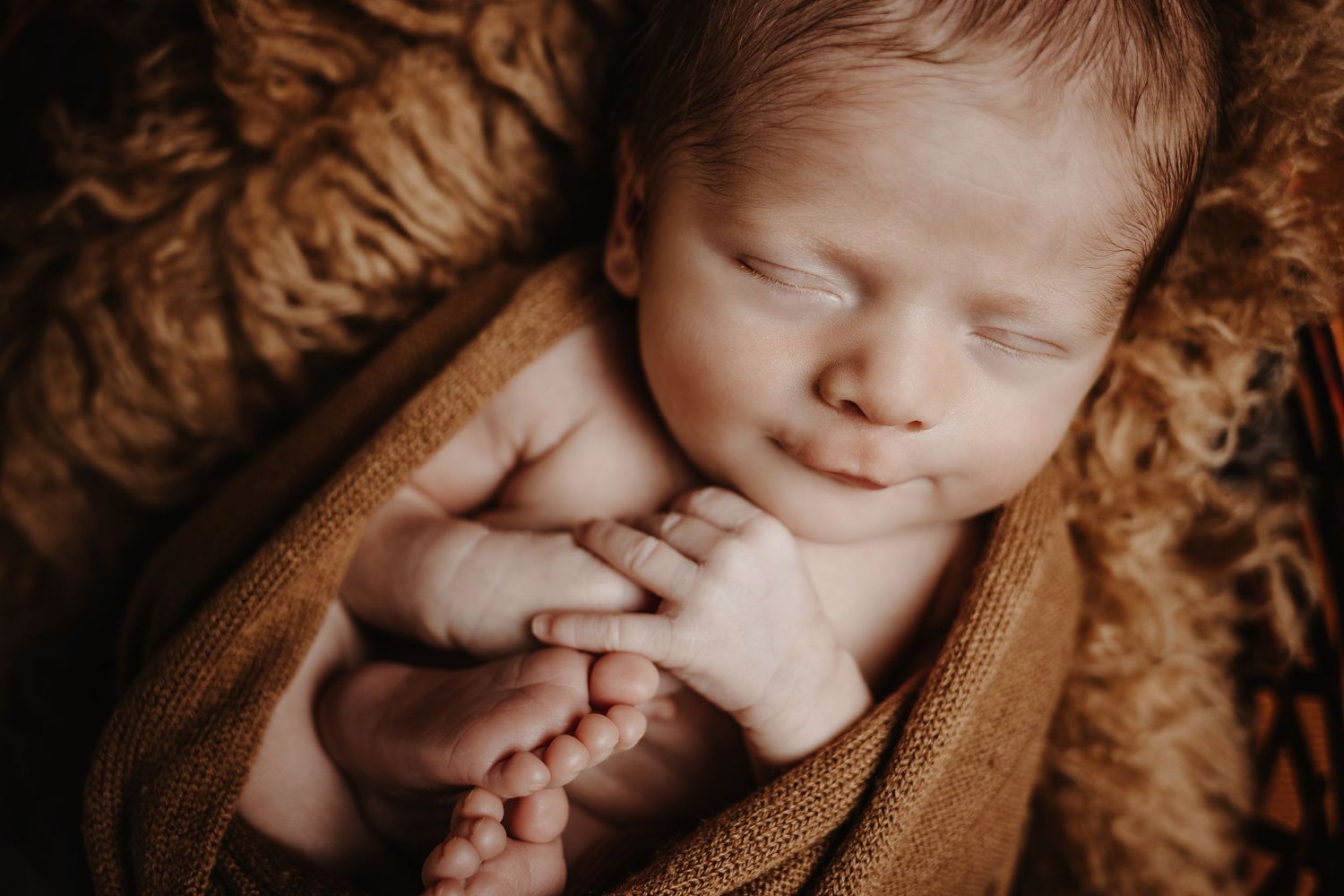 Photographie artistique Naissance bébé emmaillotage au studio à Jonzac 17500
Photographe Portraitiste de France en Charente-Maritime