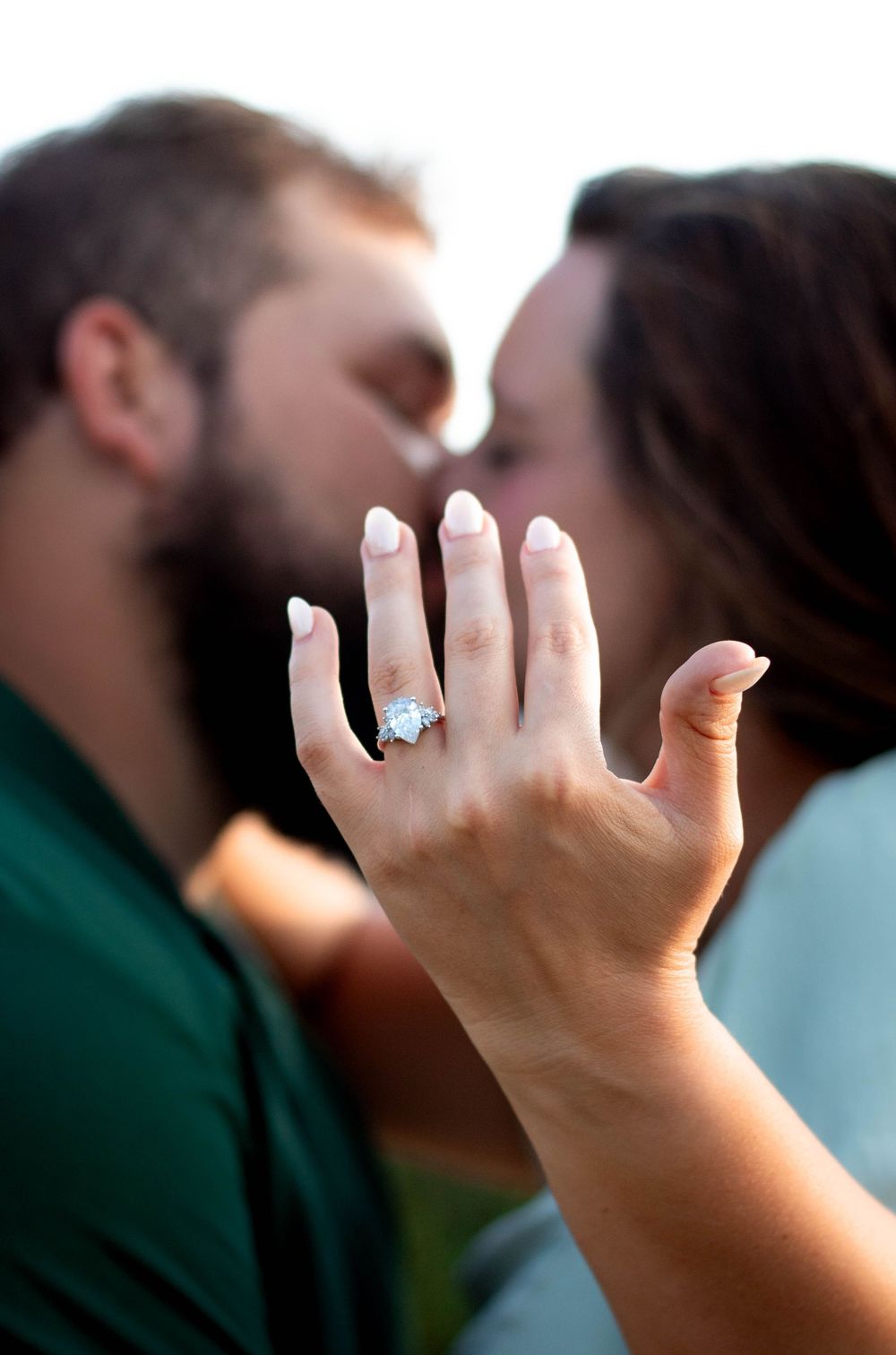 Couple smiling together during an authentic engagement session with Tay Portraits Chattanooga best photographer