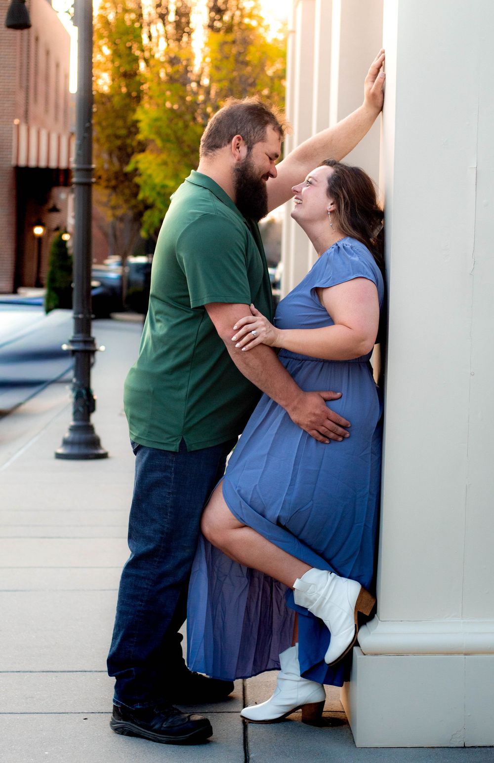 Couple smiling together during an authentic engagement session with Tay Portraits Chattanooga best photographer