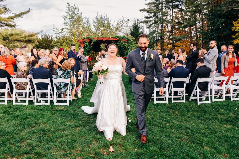 A series of outdoor wedding ceremony photos showing guests seated in white chairs on a grassy lawn during a fall celebration.
