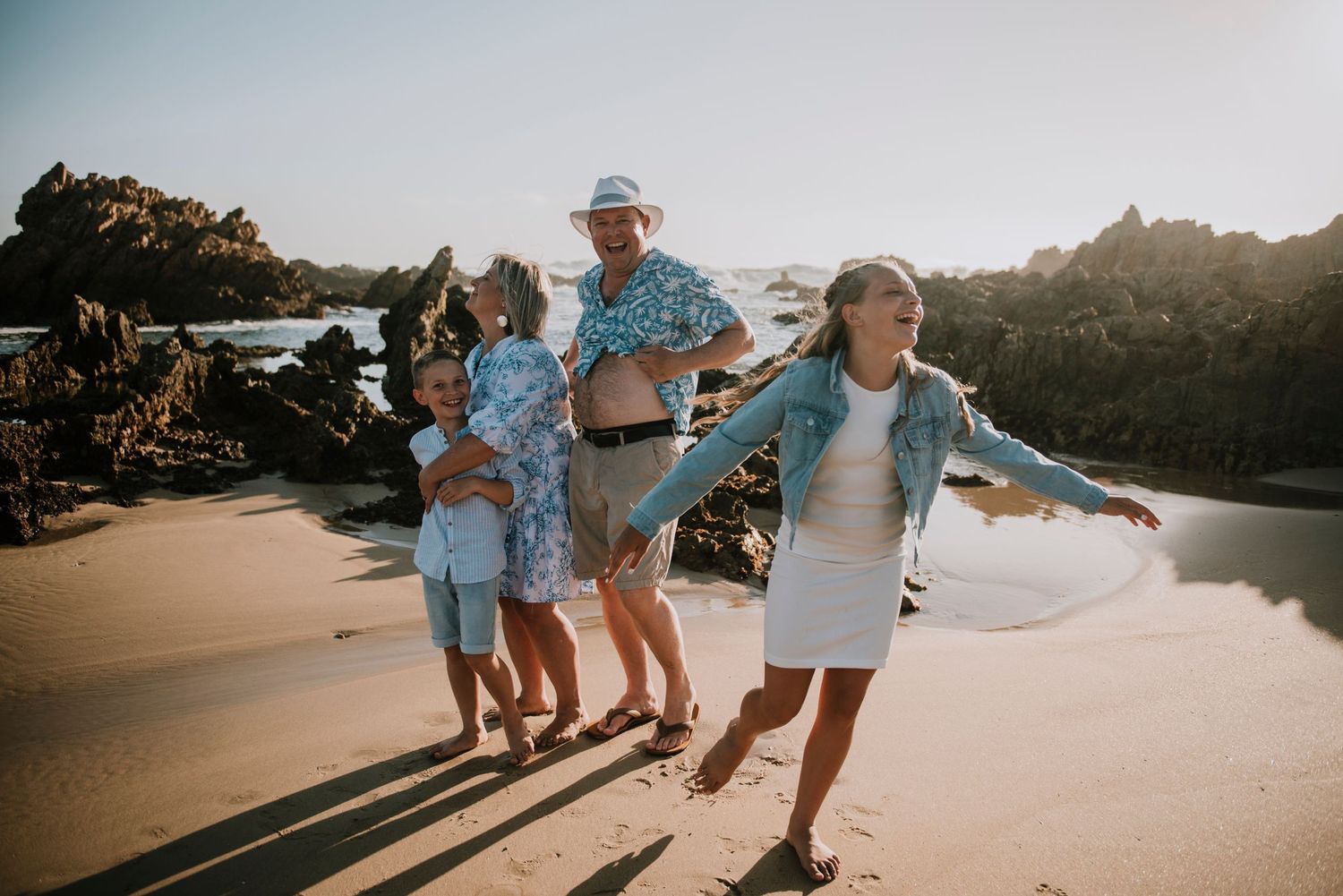 Fun mischievous photo with dad and his family on Buffels bay beach.