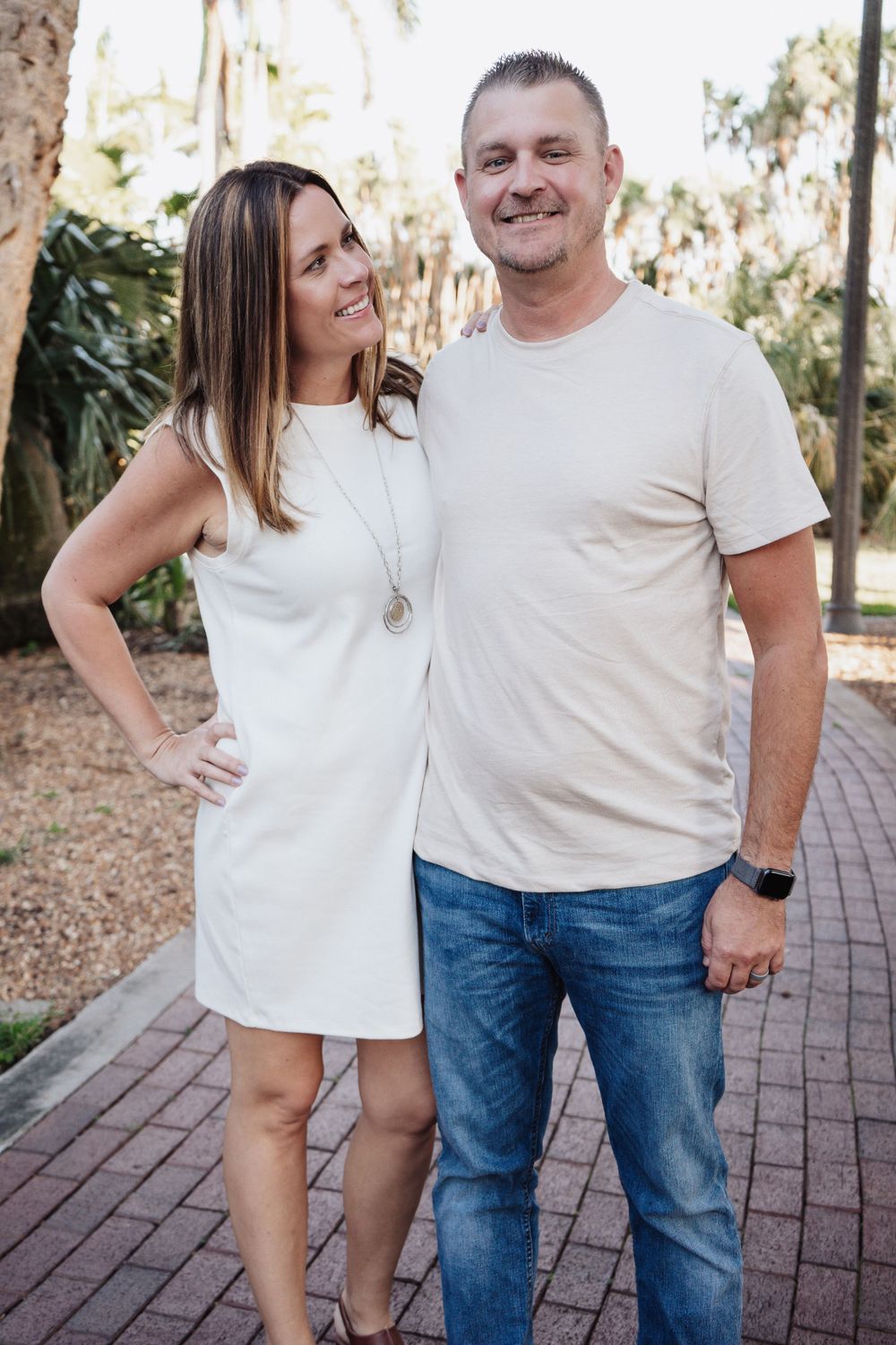 Outdoor Couples Session Gisela Kopsick Arboretum in Saint Petersburg, FL; Couple posing together on brick