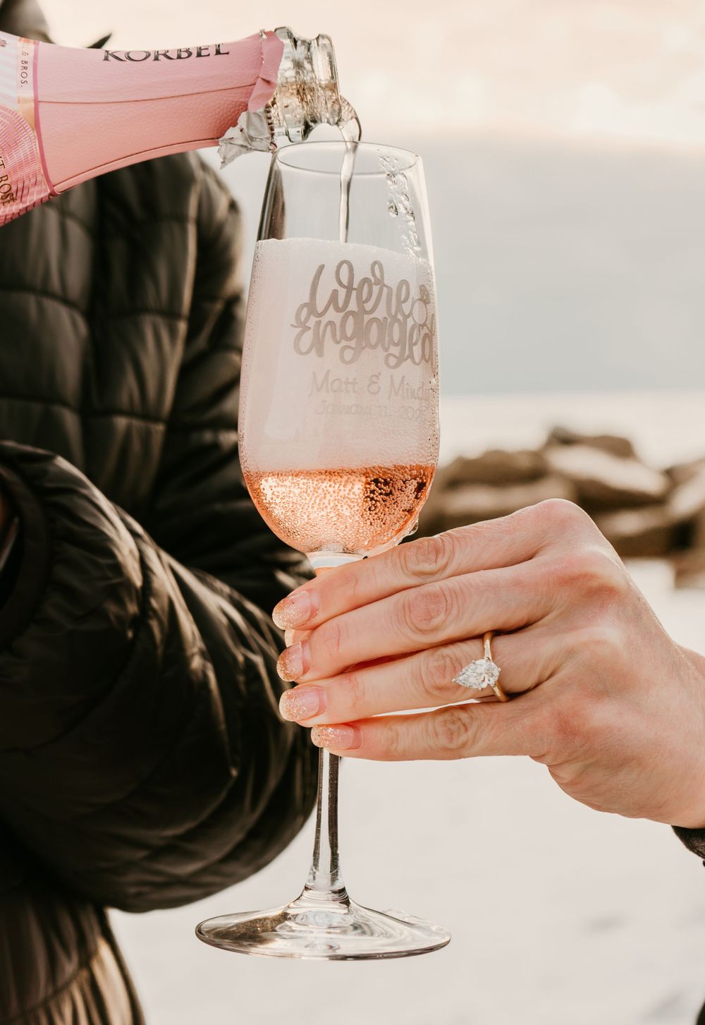 Proposal Session at Sunset Upham Beach Saint Petersburg, FL at Sunset; close up of champagne pouring and ring
