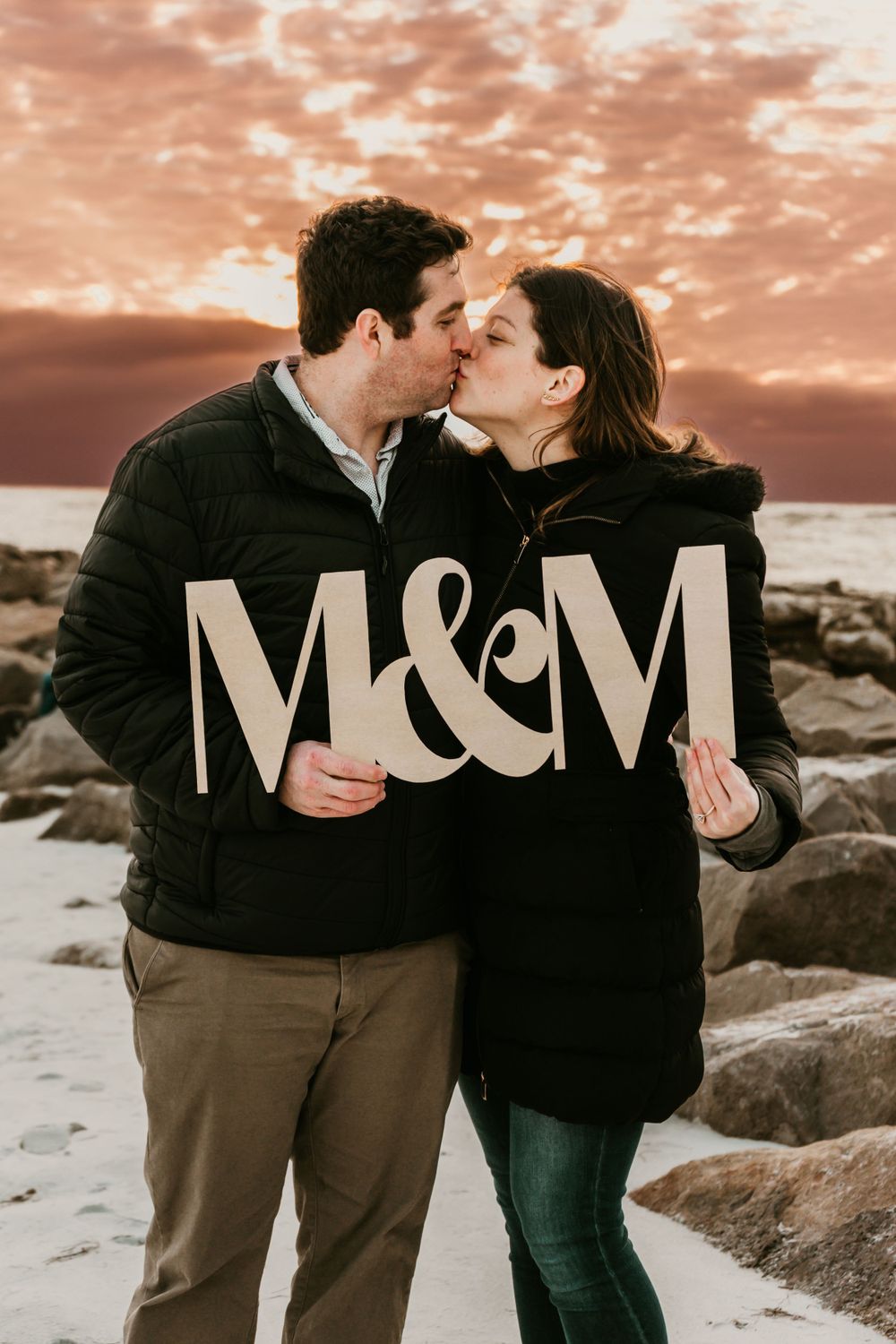 Proposal Session at Sunset Upham Beach Saint Petersburg, FL at Sunset; Couple holding sign and kissing
