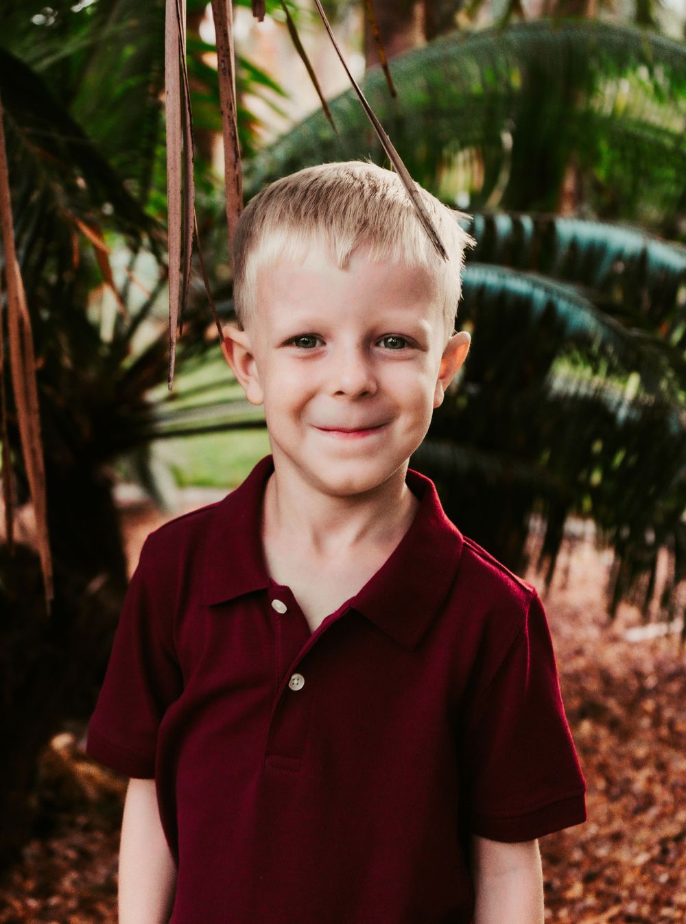 Outdoor Headshot Session Gisela Kopsick Arboretum in Saint Petersburg, FL; Young boy posing near palms