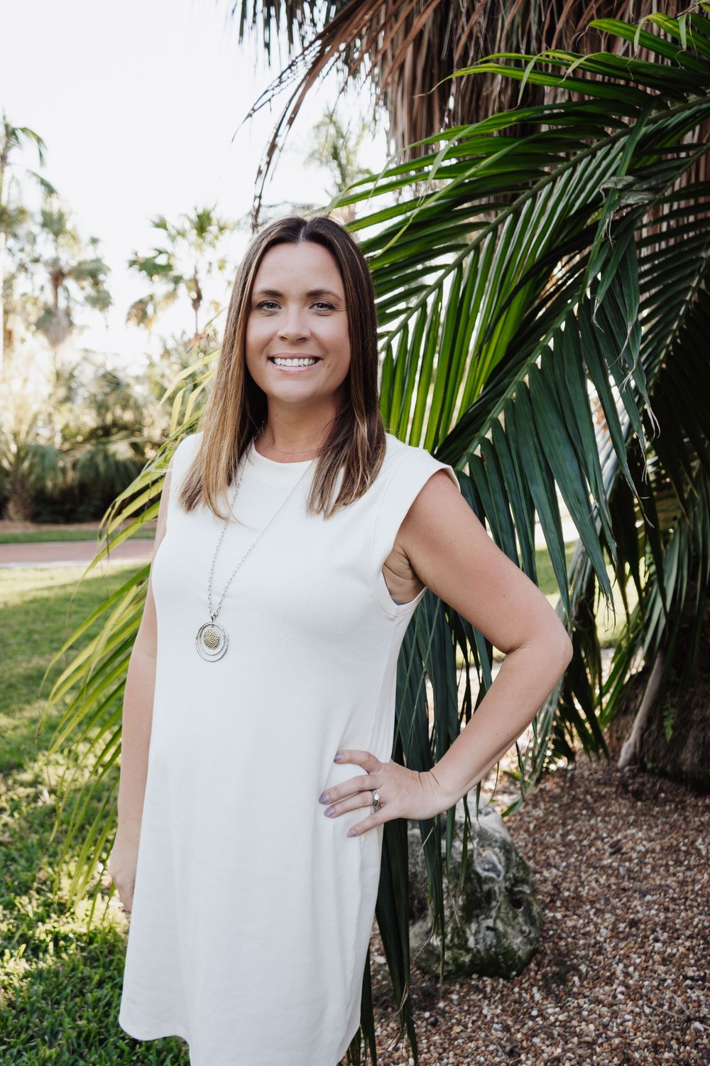 Outdoor Headshot Session Gisela Kopsick Arboretum in Saint Petersburg, FL; woman posing near palms