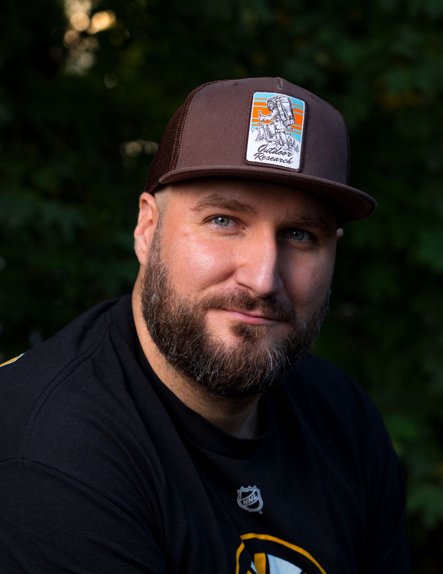 Self portrait of Zach Wallace wearing his favorite Outdoor Research hat, taken in 2024.