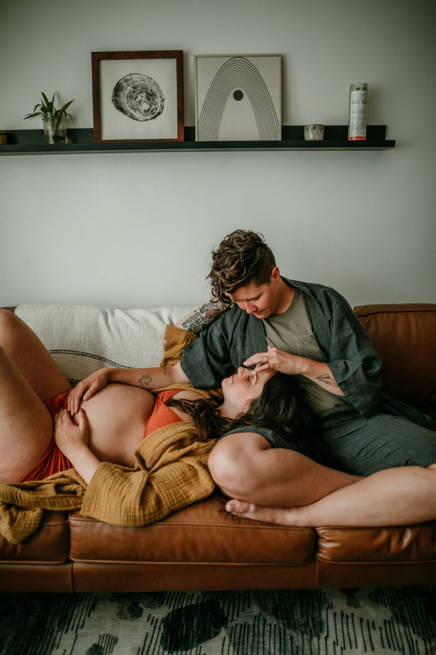 queer couple getting lost in a moment during maternity photography session portland oregon rushes & waves