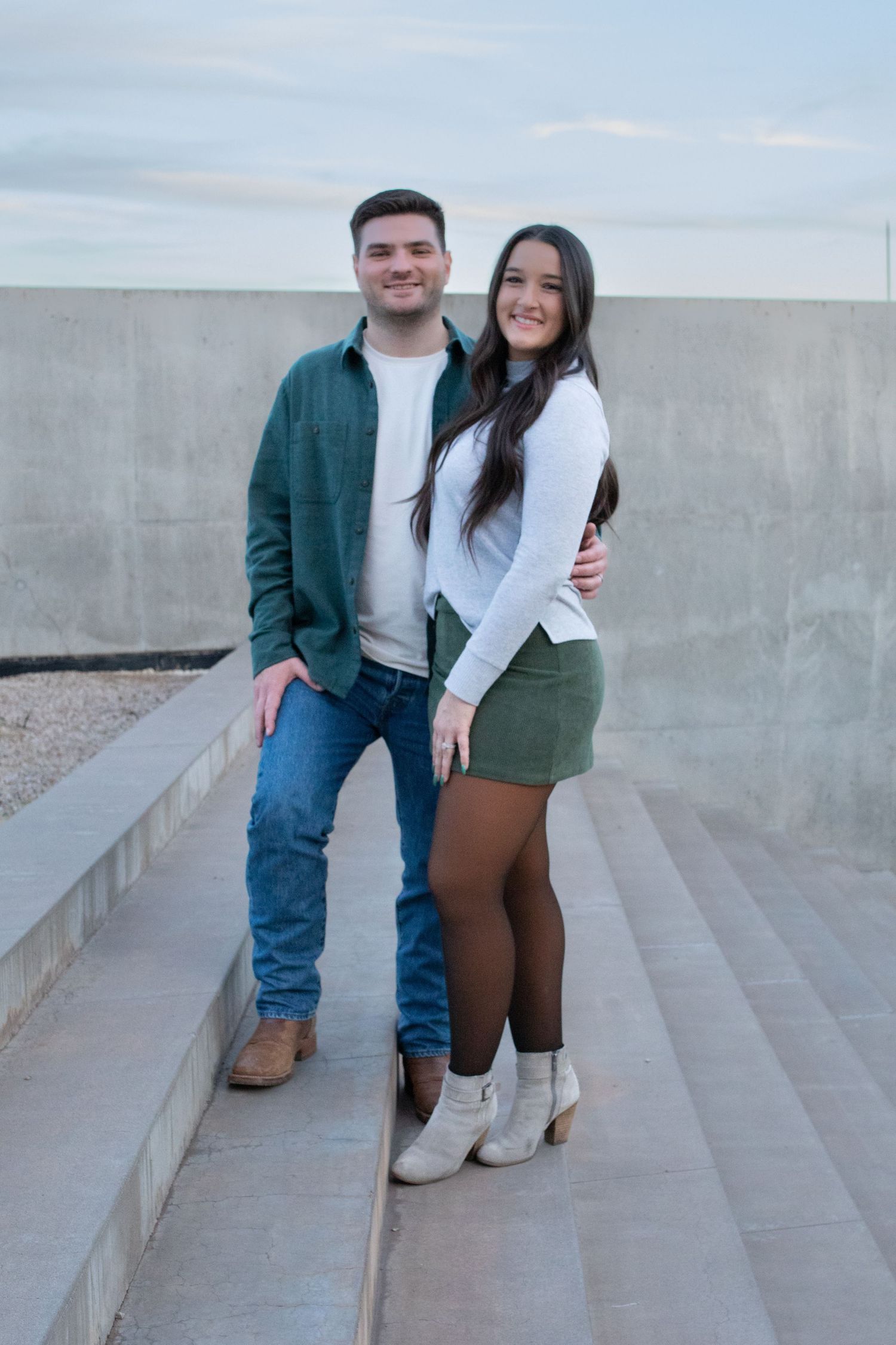 Two Sister sitting on steps at Roosevelt Row for Phoenix Senior Pictures