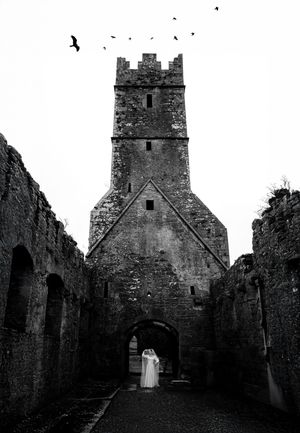 Haunting black and white images of a medieval church ruins with dramatic lighting and shadows.