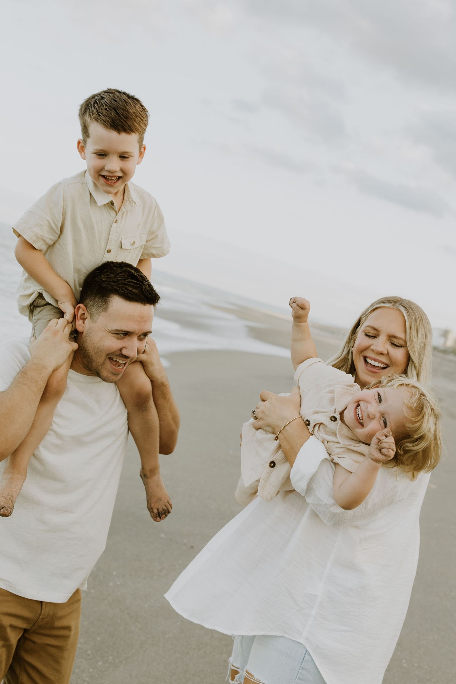 Extended family photos at the beach and Clock Tower in Palm Beach, Florida captured by Lindsay McDow Photography. Worth Ave on the island