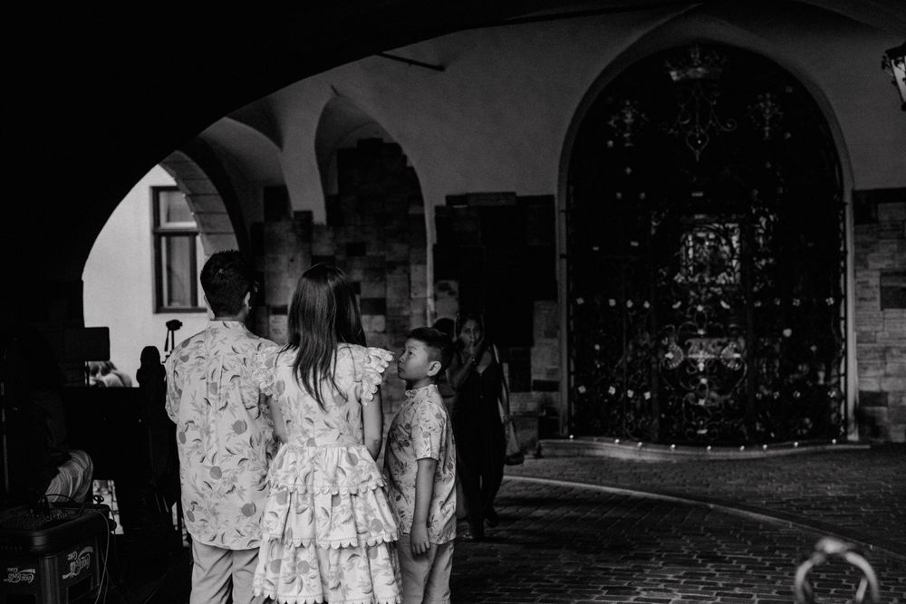"Family smiling and enjoying a sweet, intimate moment in Zagreb, surrounded by the charm of the city.