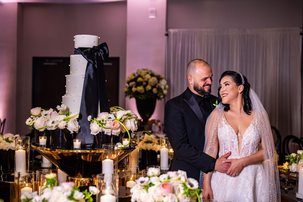 Elegant wedding reception with floral centerpieces and mood lighting.