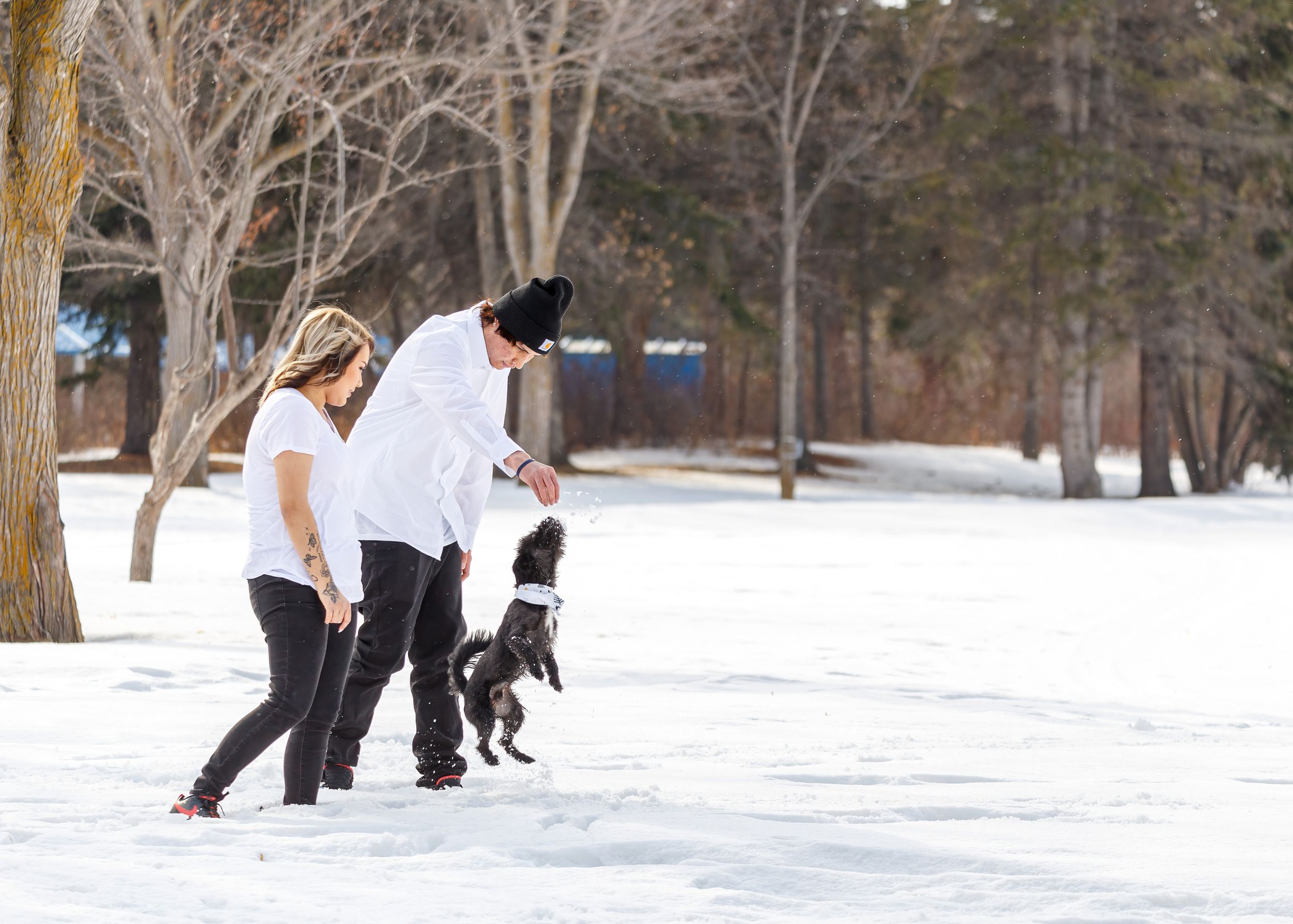 Couple walking through the snow