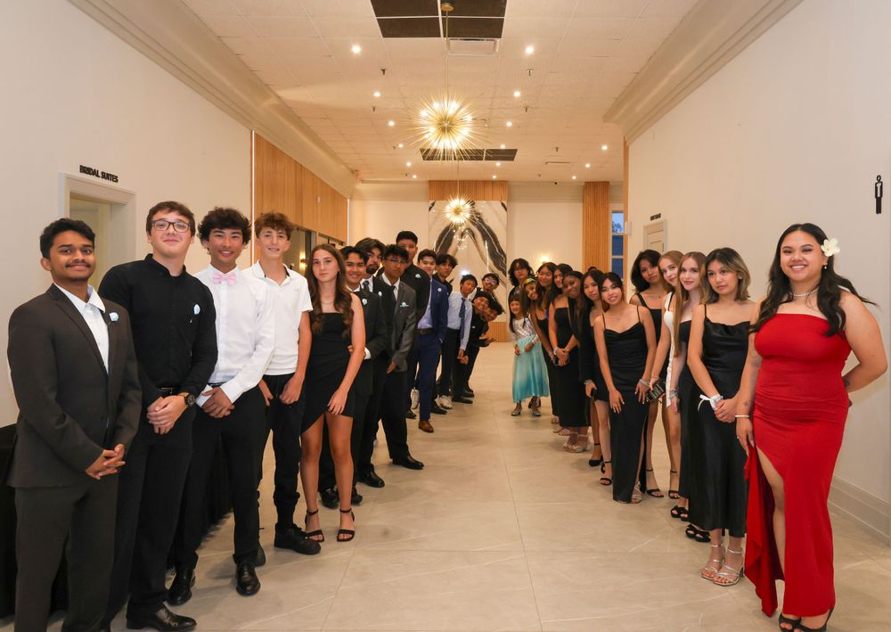 Group of people dressed up for birthday