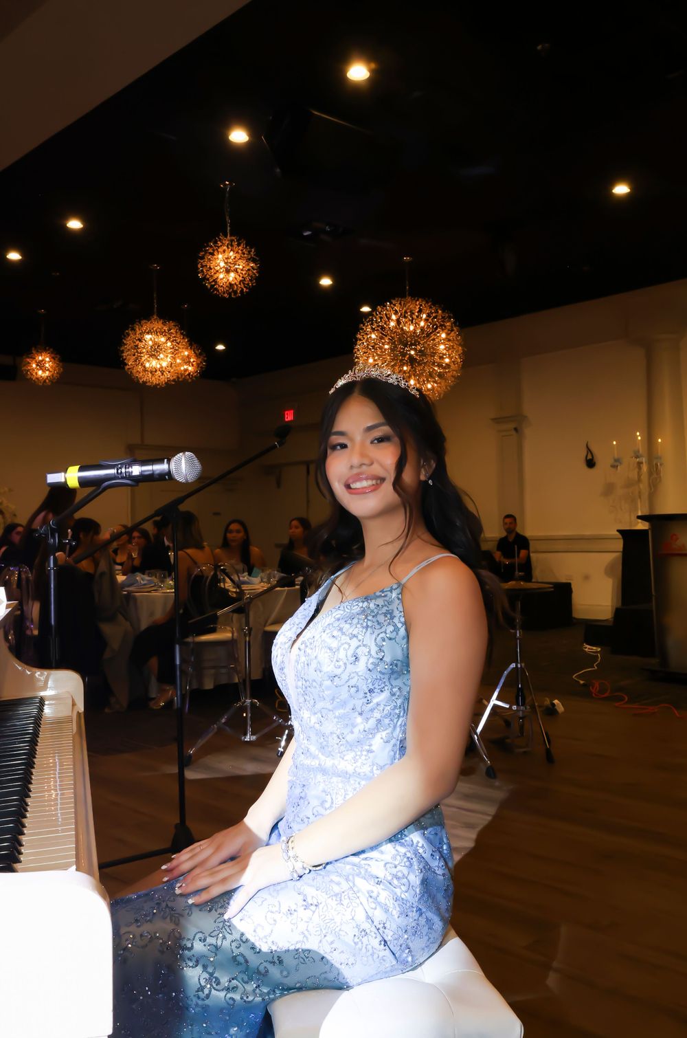 Girl sitting at piano