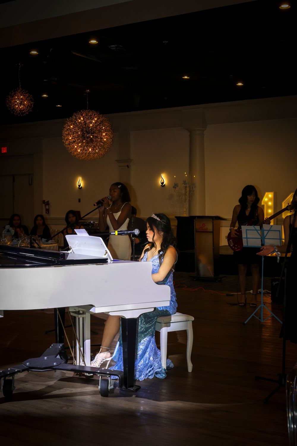 Girl sitting at piano