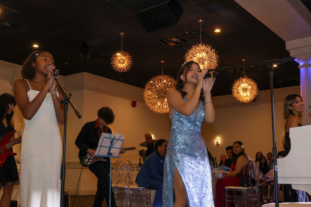 Two girls singing