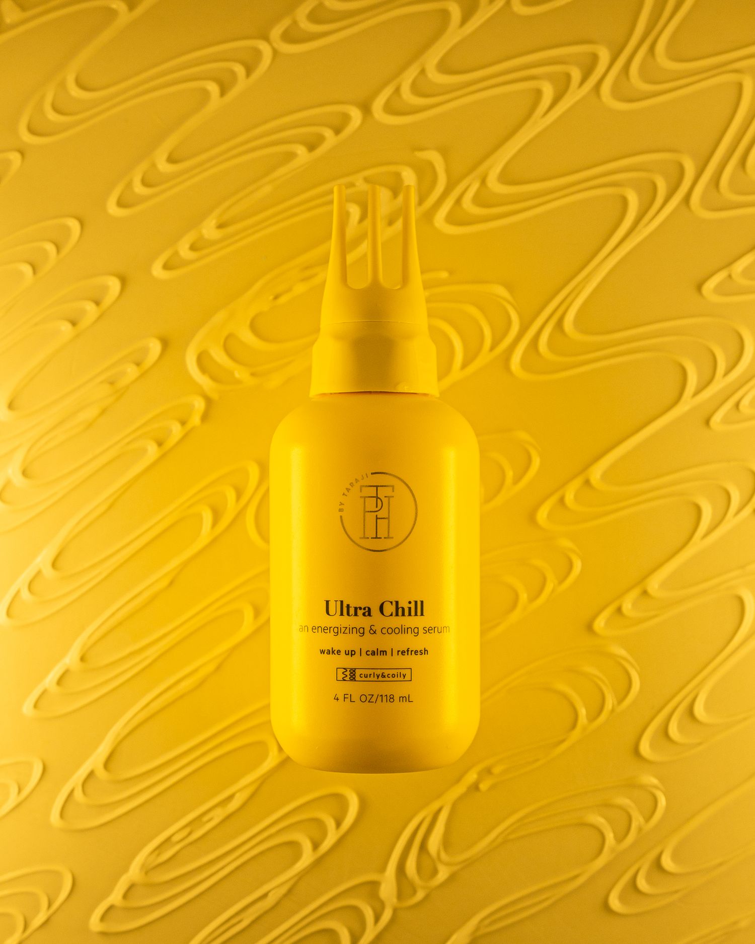 Yellow Ultra Chill bottle photographed against wavy textured yellow backdrop.