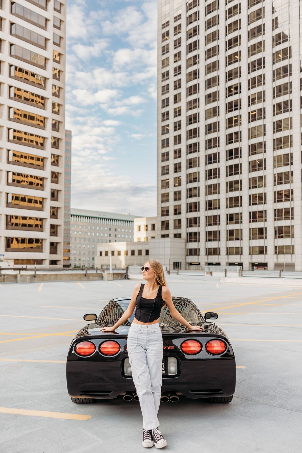 Portrait of a senior girl on top of a rooftop in downtown Cincinnati. Cincinnati, Northern Kentucky, and Chicago Portrait Photographer.