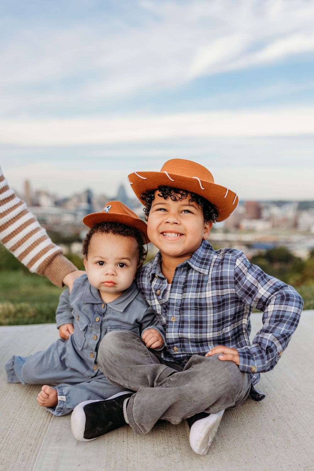 Portraits of brothers with Cincinnati skyline in the background. Cincinnati, Northern Kentucky, and Chicago Portrait Photographer.