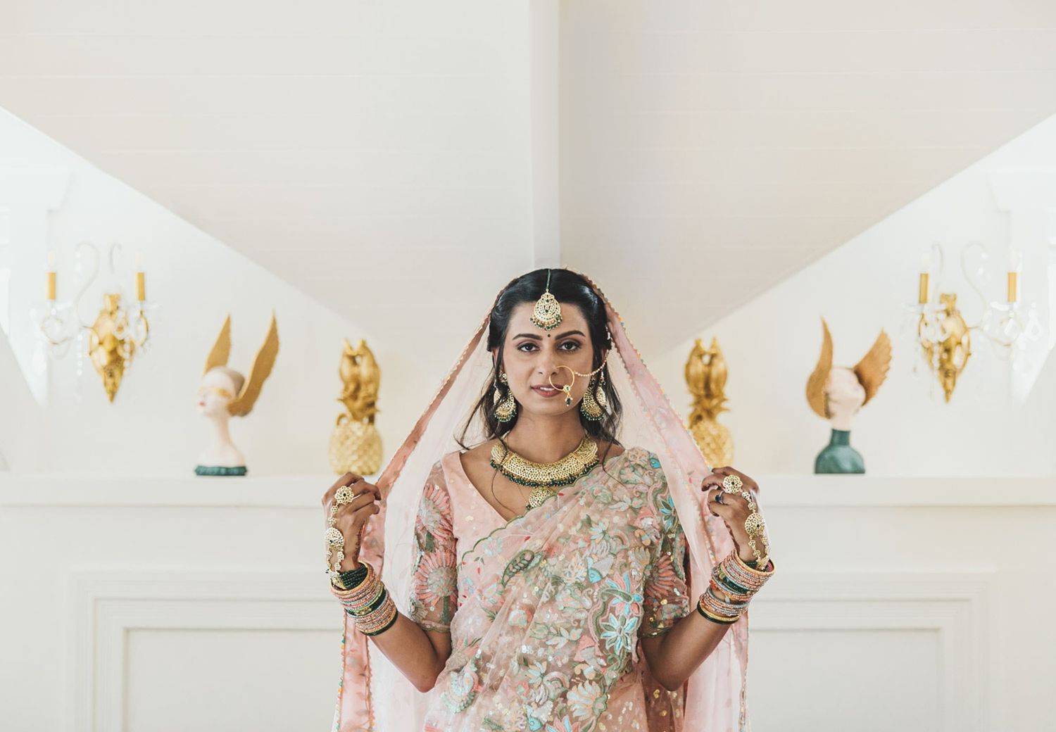 Indian Beautiful bride on her Pink wedding dress looking like a queen. Auckland Photographer