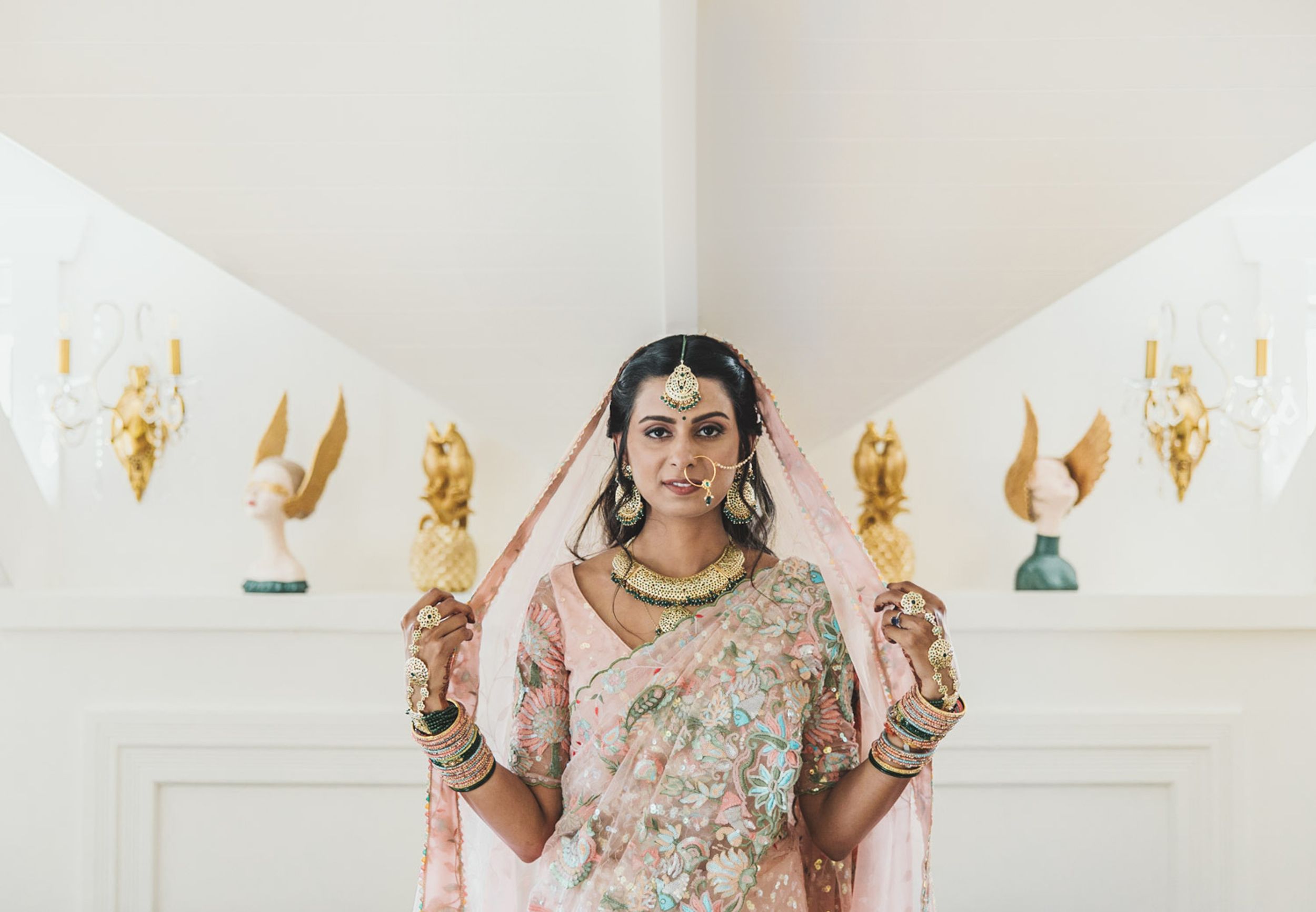 Indian Beautiful bride on her Pink wedding dress looking like a queen. Auckland Photographer