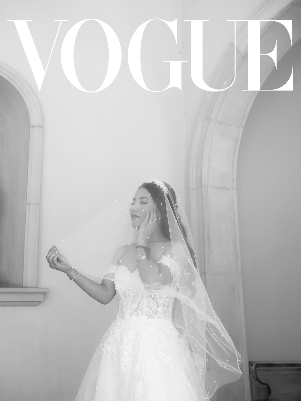Elegant bridal portrait in Vogue style featuring a flowing white gown and veil against arched windows.