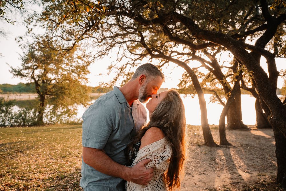 Lifestyle Family session in DFW featuring romance and connection at golden hour lakeside