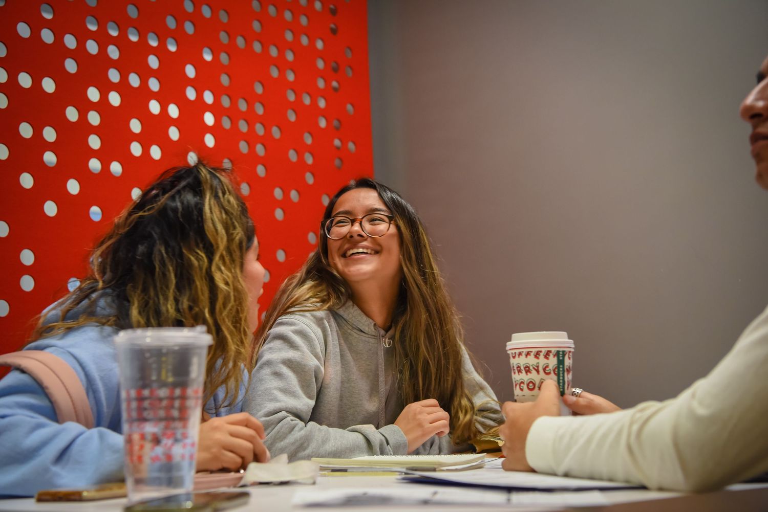 student laughing in student center HIGHER EDUCATION PHOTOGRAPHER, UNIVERSITY PHOTOGRAPHER