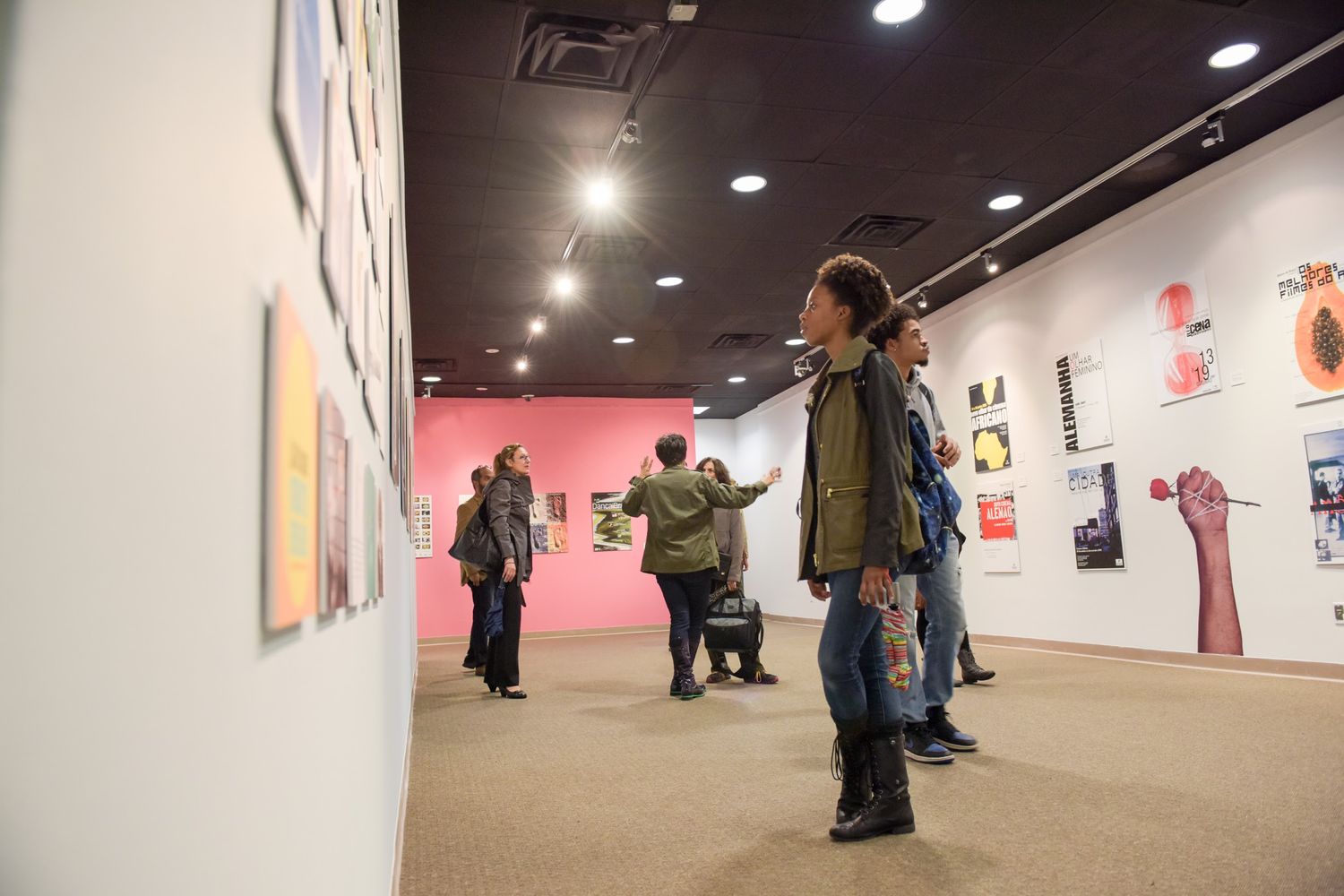 student at an art show at a university HIGHER EDUCATION PHOTOGRAPHER, UNIVERSITY PHOTOGRAPHER