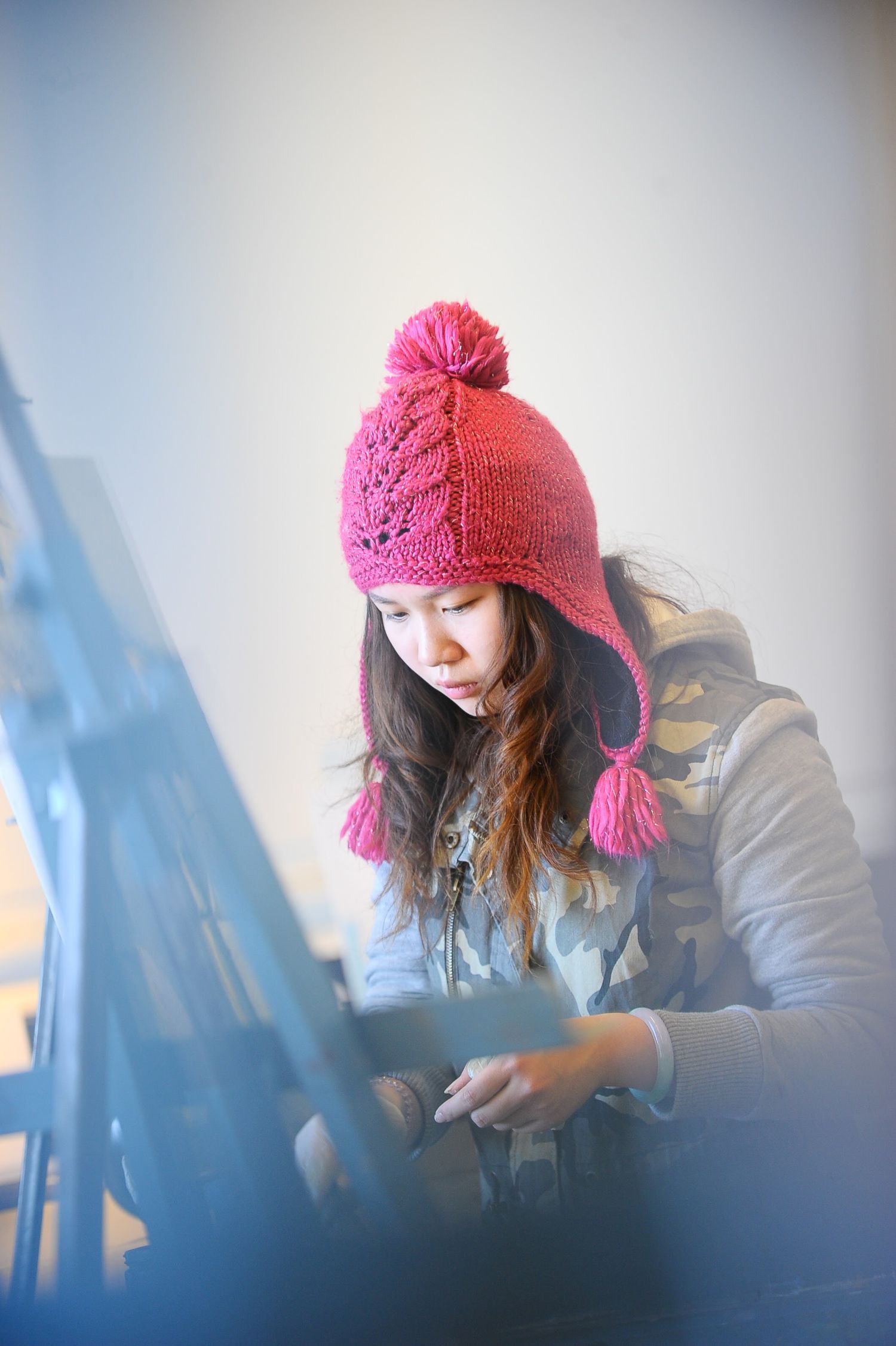 student painting at a university class HIGHER EDUCATION PHOTOGRAPHER, UNIVERSITY PHOTOGRAPHER