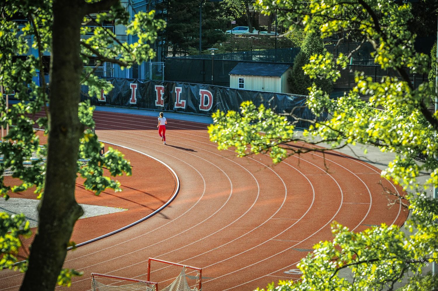 university student running on track HIGHER EDUCATION PHOTOGRAPHER, UNIVERSITY PHOTOGRAPHER