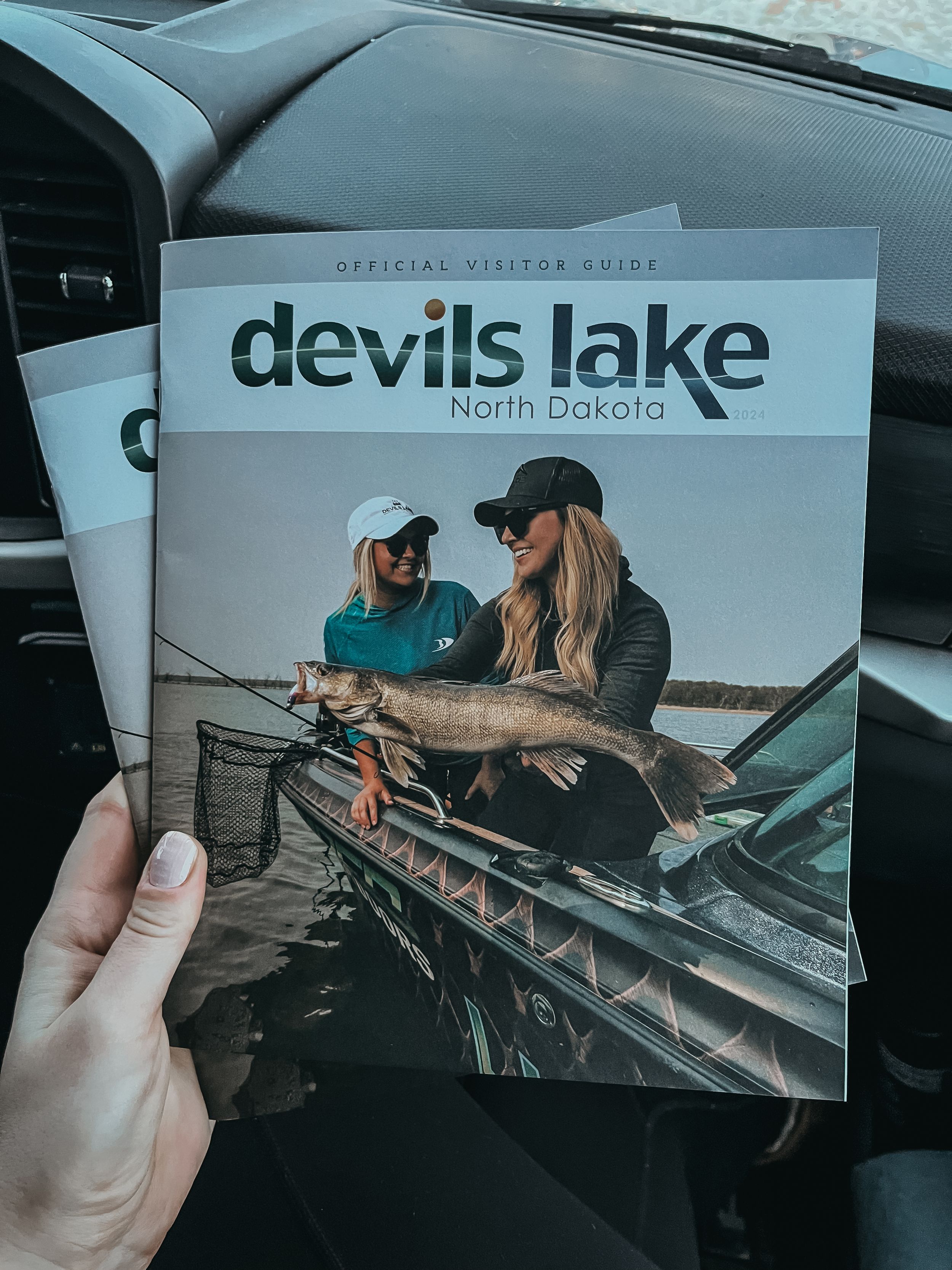 Series of postcards showing Devils Lake, North Dakota fishing scenes.
