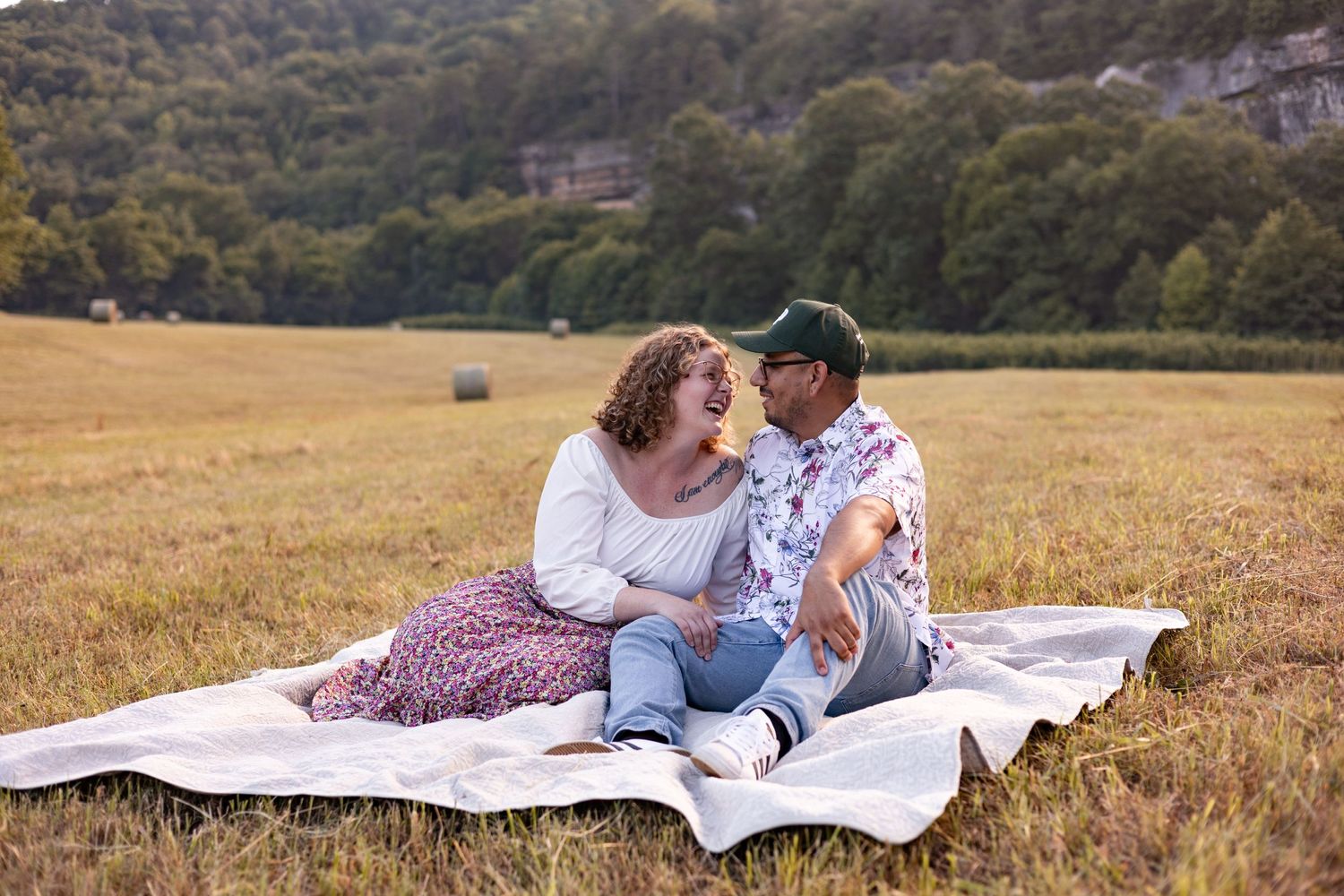 buffalo river engagement session steel creek Ponca arkansas sitting and laughing