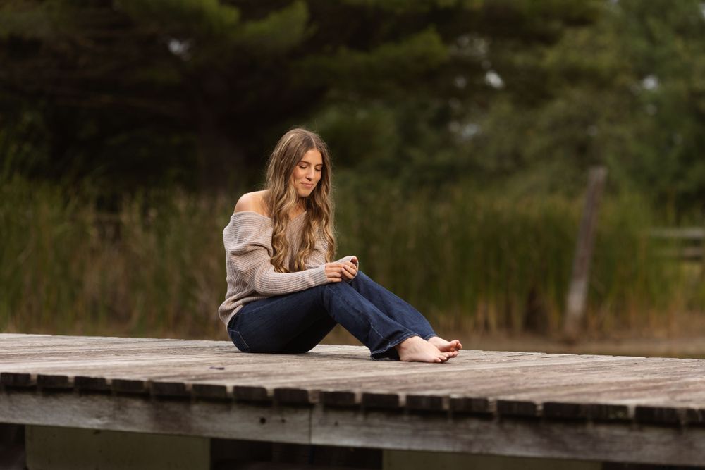 Ladies senior session on a dock outside of Teutopolis, Illionis.