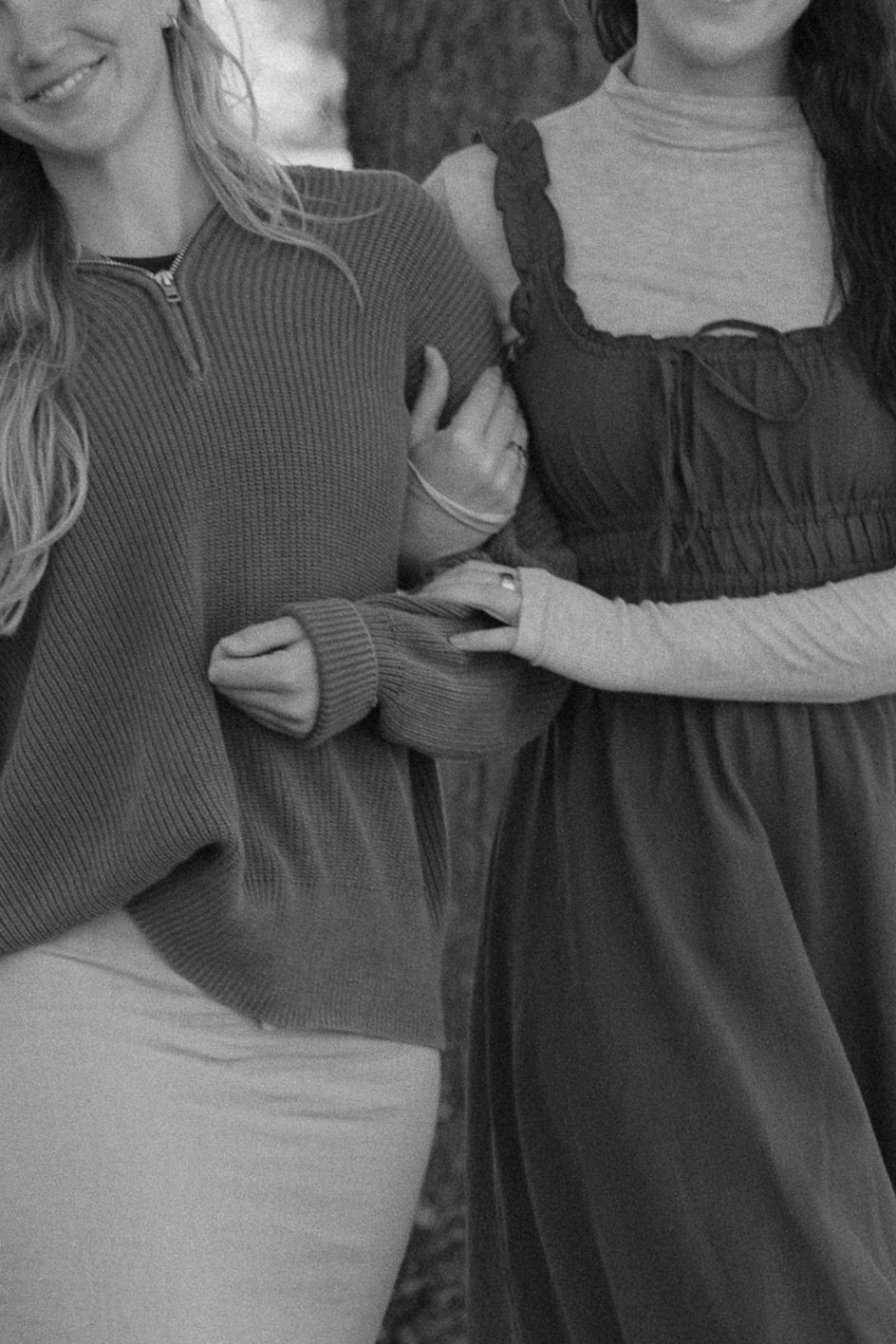 A series of black and white fashion photos showing close-up details of a ribbed sweater and dress combination.