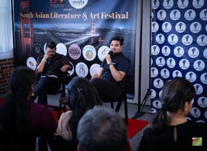 Panel discussion at South Asian Literature and Art Festival with Golden Gate Bridge backdrop.