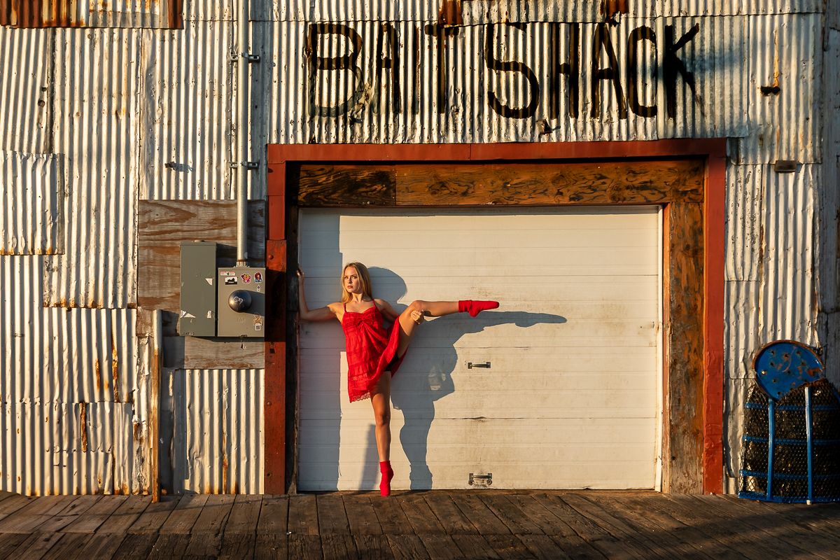 Series of urban dance movements against corrugated metal wall backdrops in dramatic lighting.
