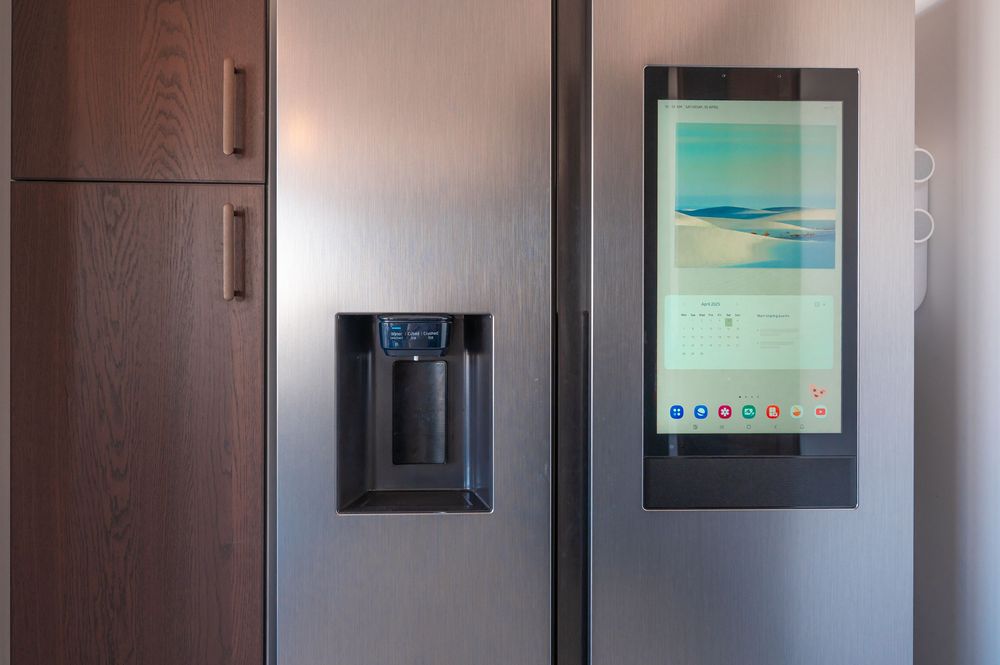 Contemporary wall mounted control panels and displays in minimalist hallway.