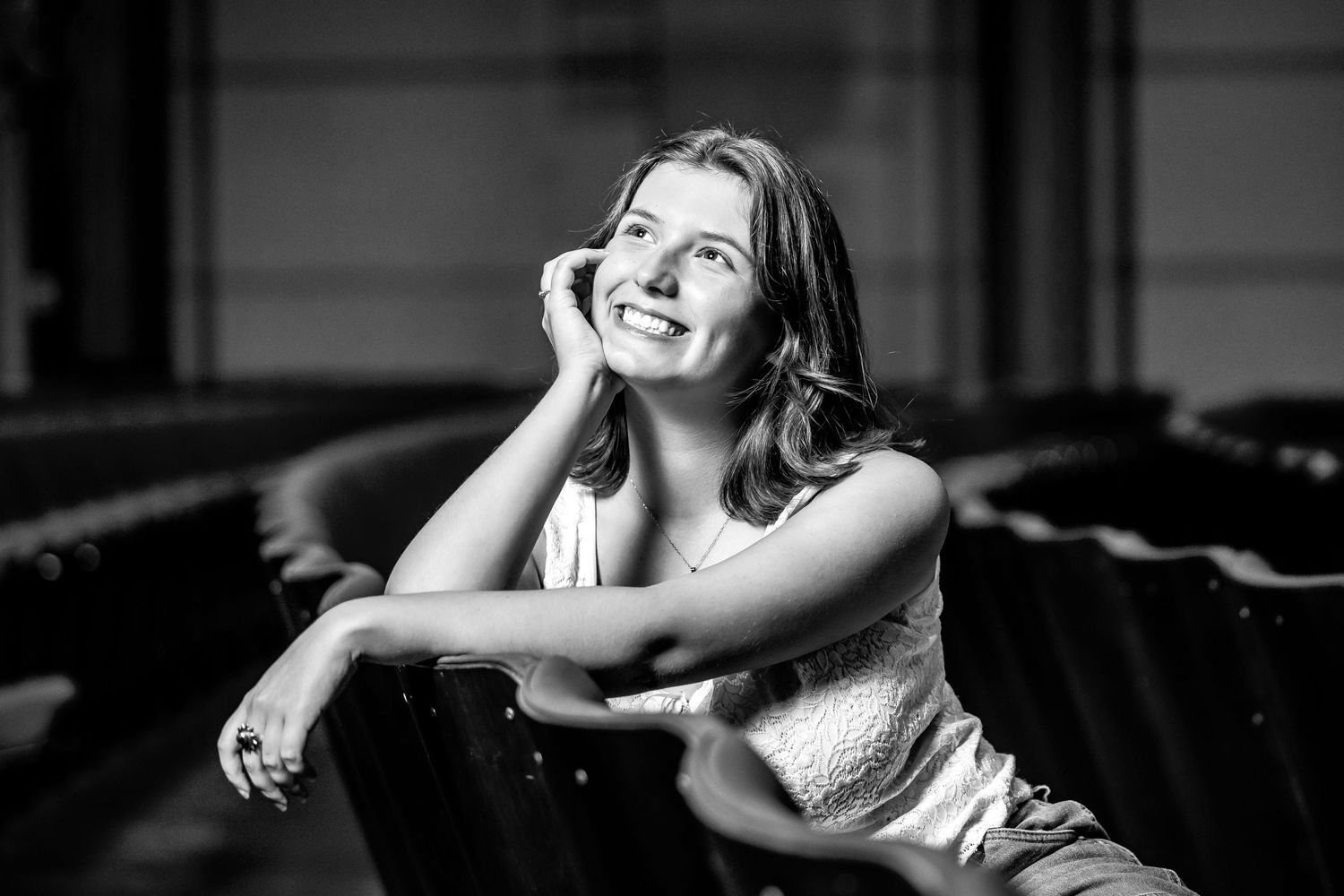 Artistic black and white portrait with dramatic lighting and poses.
