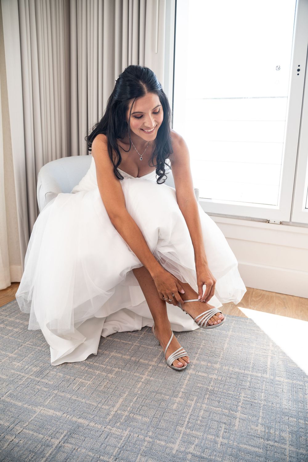 Bride in White Wedding Dress, Getting Ready, Putting on Shoes