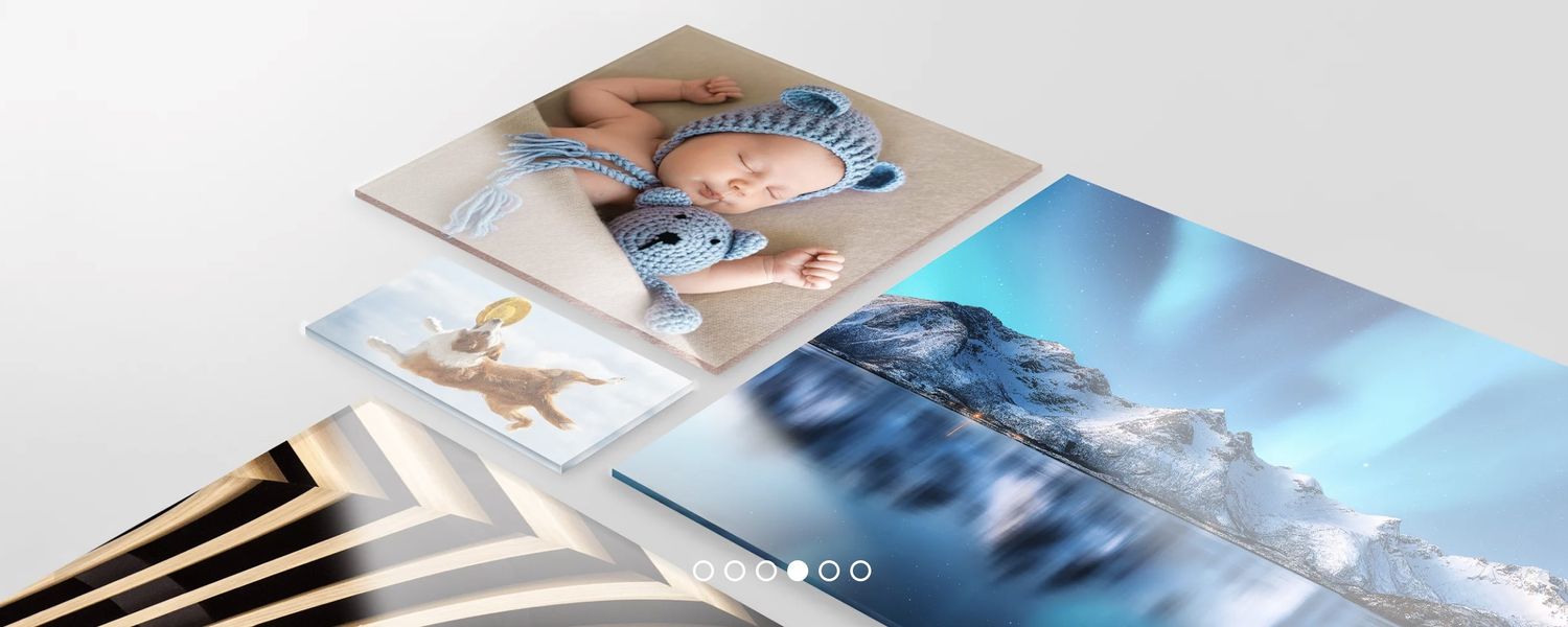 Flat-lay of premium photo prints and custom acrylic blocks, showcasing different portraits,  high-quality finish. vivitu personalised print