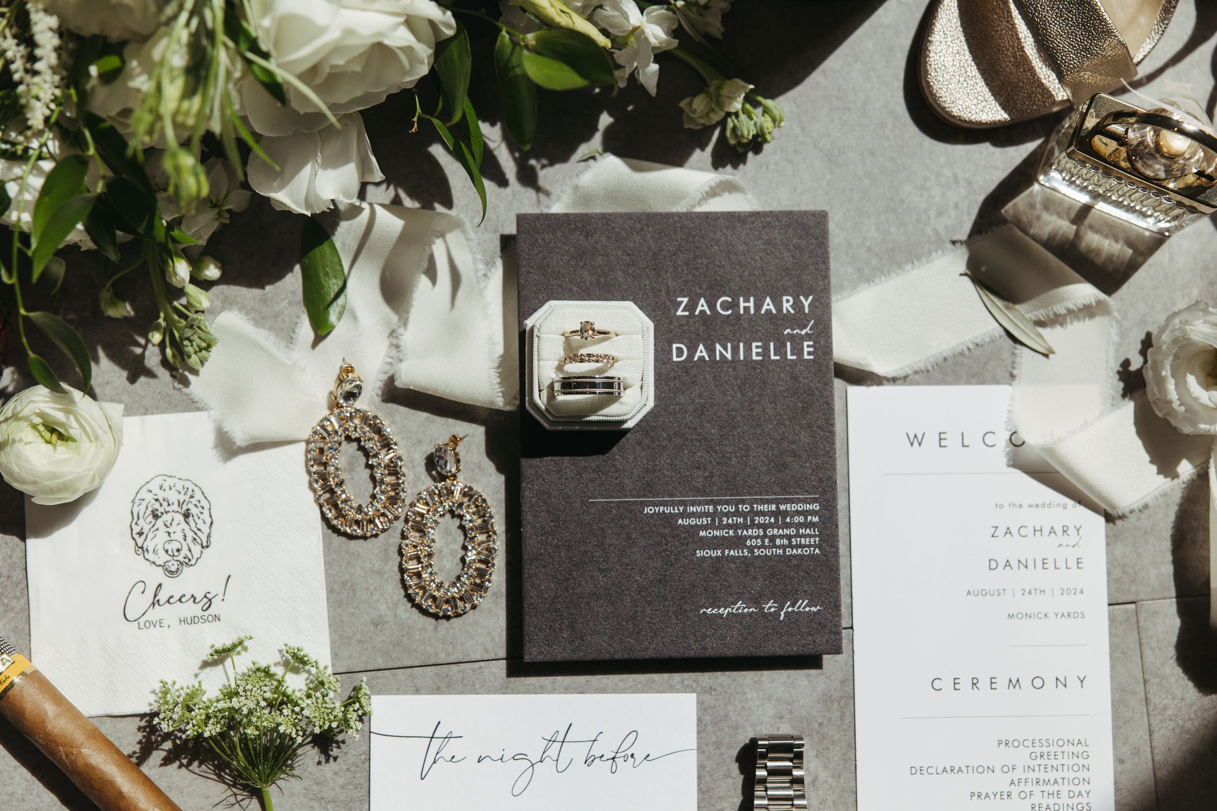 Elegant wedding stationery and invitation suite with floral details.