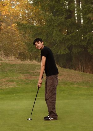 A sequence of golf shots shows a golfer lining up and putting on a lush green course during autumn.