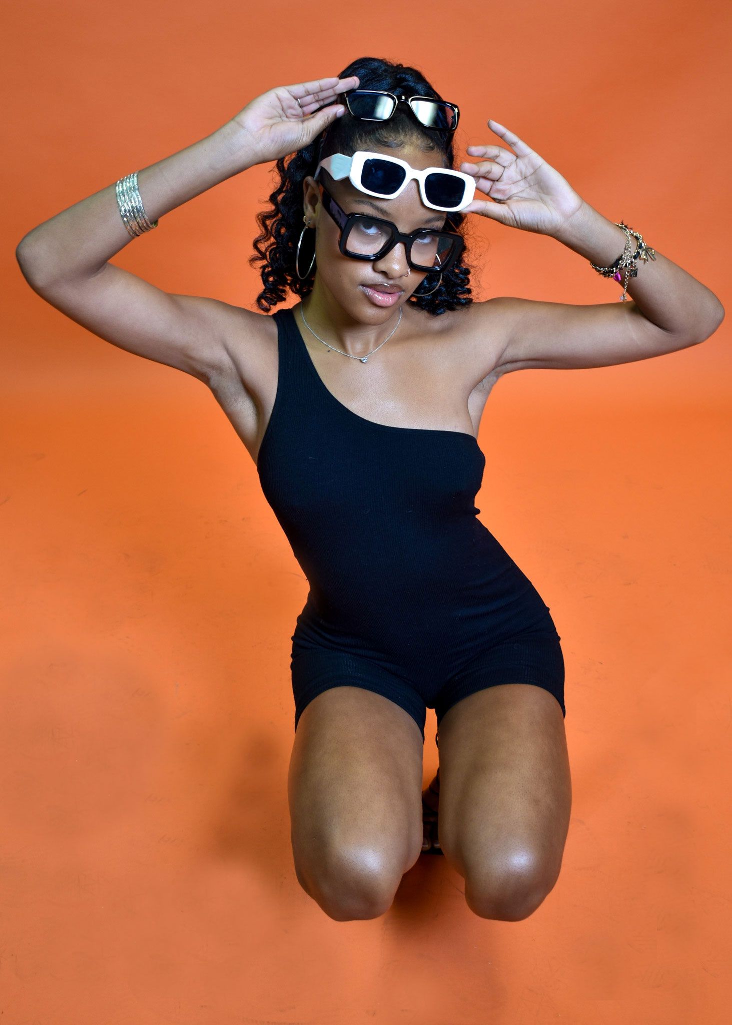 model posing with sunglasses